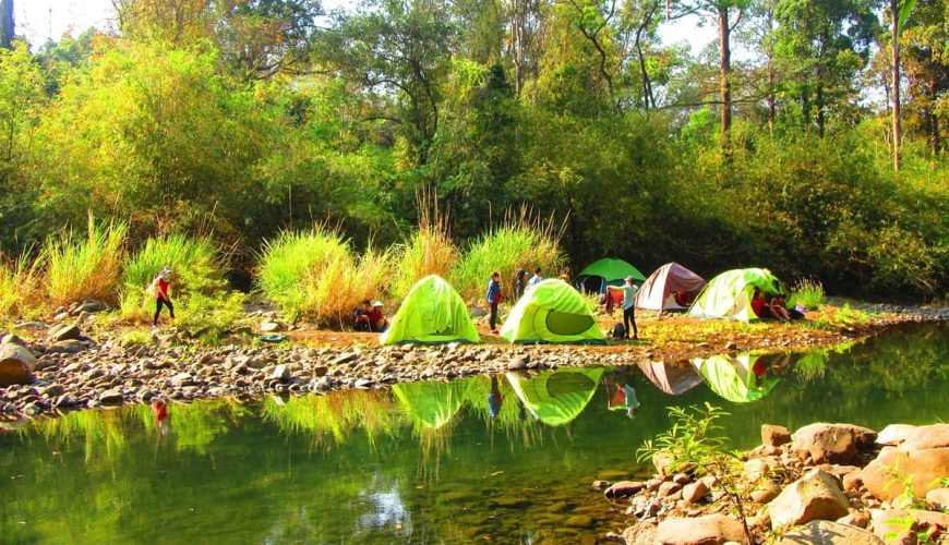 Trekkers set up tentss by Dak Ca Stream inside Bu Gia Map National Park in Binh Phuoc Province. Photo by Kieu Dinh Thap